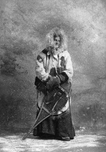Mrs. William C. Bompas with snowshoes, Montreal, QC, 1896