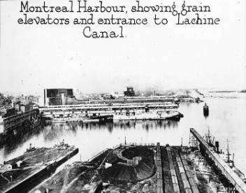 Harbour, grain elevators and Lachine Canal entrance, Montreal, QC, about 1930