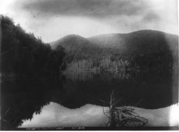 Reflection, Commandeau (Commandant) Lake, amongst the Laurentian Mountains, QC, about 1868