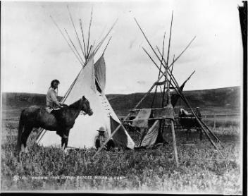 Emonis (The Otter) and camp, T'suu T'ina, near Calgary, AB, about 1885