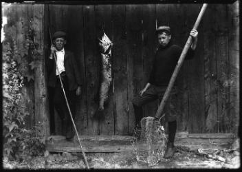 Bruce Millar and Bobby Watts with large maskinonge, QC, 1909 (?)