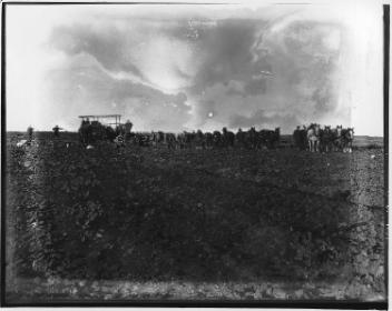 Disking with tractors and horses, Curtis farm near Sheppard, AB, about 1920
