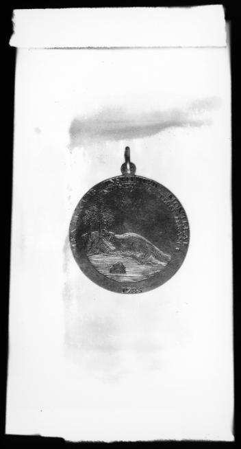James McGill's Beaver Club medal, 1785, photographed for the Beaver Club in 1923