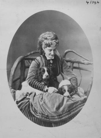 Miss King and dogs, Montreal, QC, 1869